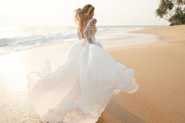 Lace dress beach wedding